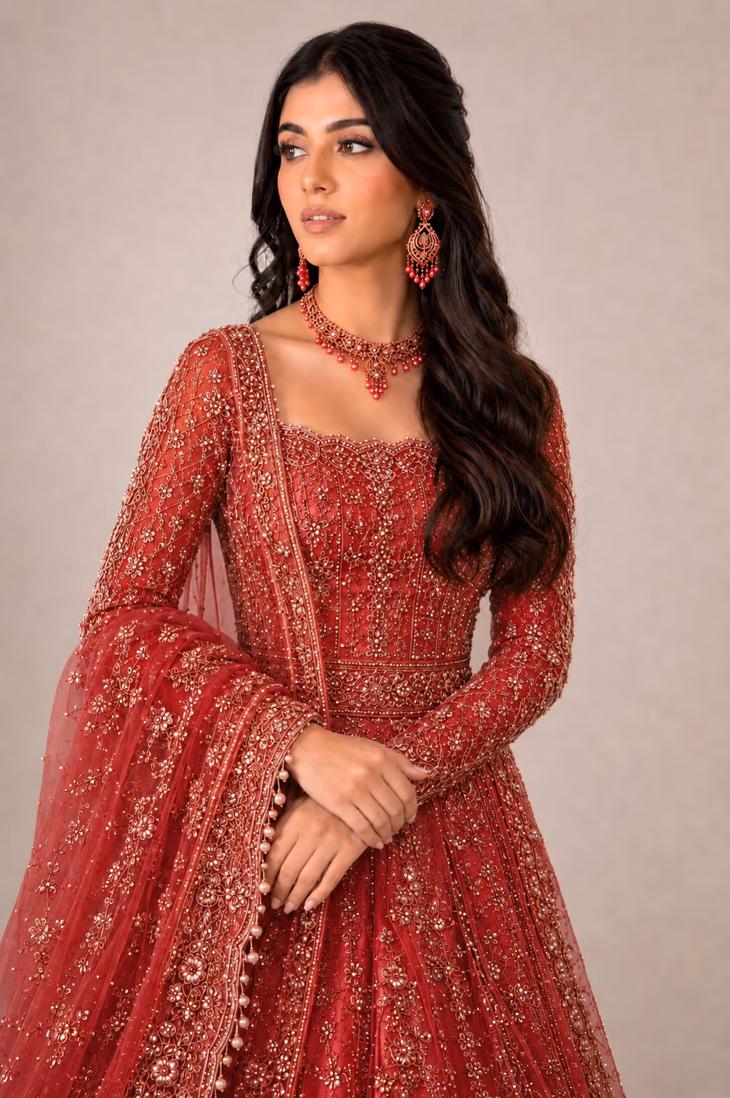 The same embroidered dress recolored ruby red